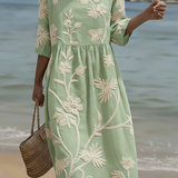 "Florence Waverly™ - Ziedu Komforta Midi Kleita" can be rewritten as "Florence Waverly™ - Floral Comfort Midi Dress".