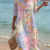 "Clara Waverly™ - Ziedu Pārlikuma Kleita" can be rewritten as "Clara Waverly™ - Floral Overlay Dress".