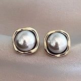 Liis | Elegant earrings with black pearls for a reliable time